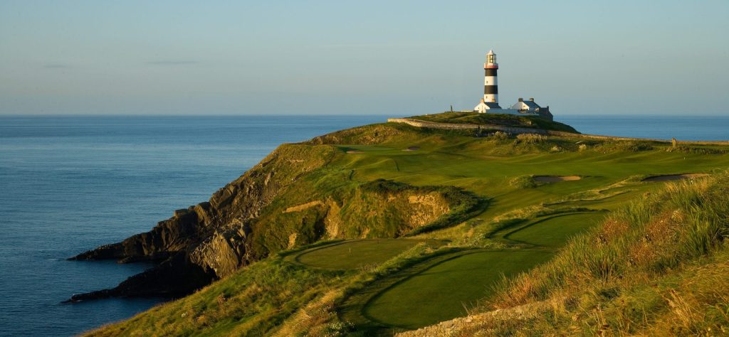 Lighthouse sitting on the cliffs at Old Head Golf Links