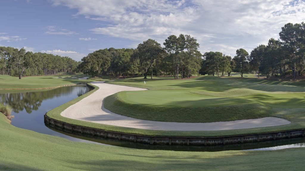 Green protected by a bunker and a water hazard