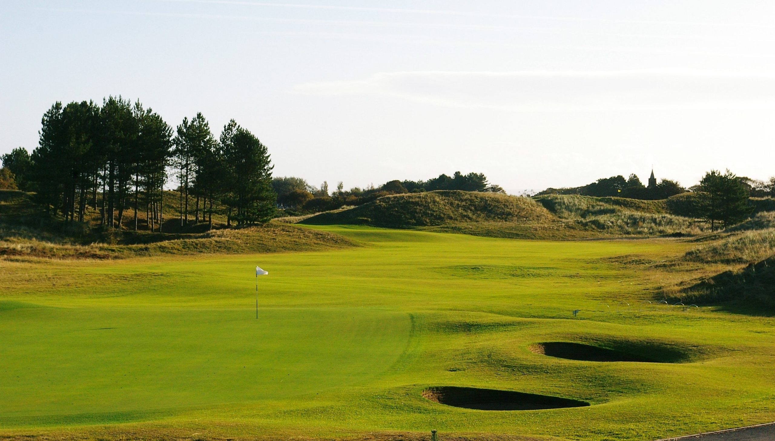 Green fairways and pot bunkers at Southport and Ainsdale Golf lub