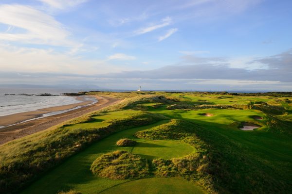 Long shadows being cast across the coastline dunes at Trump Turnberry, Scotland